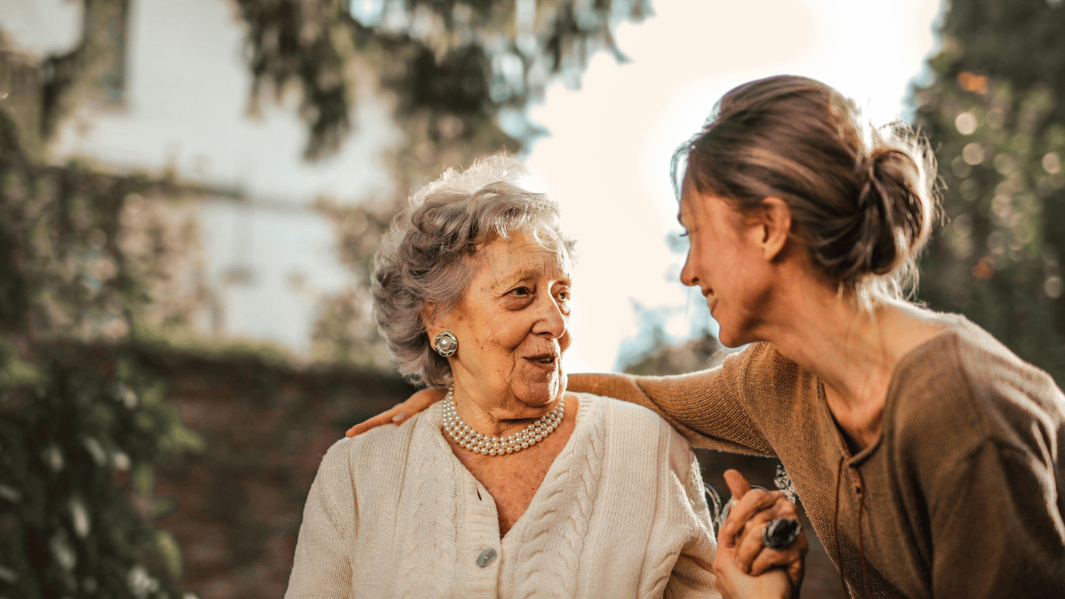Elderly-woman-smiling-family-garden
