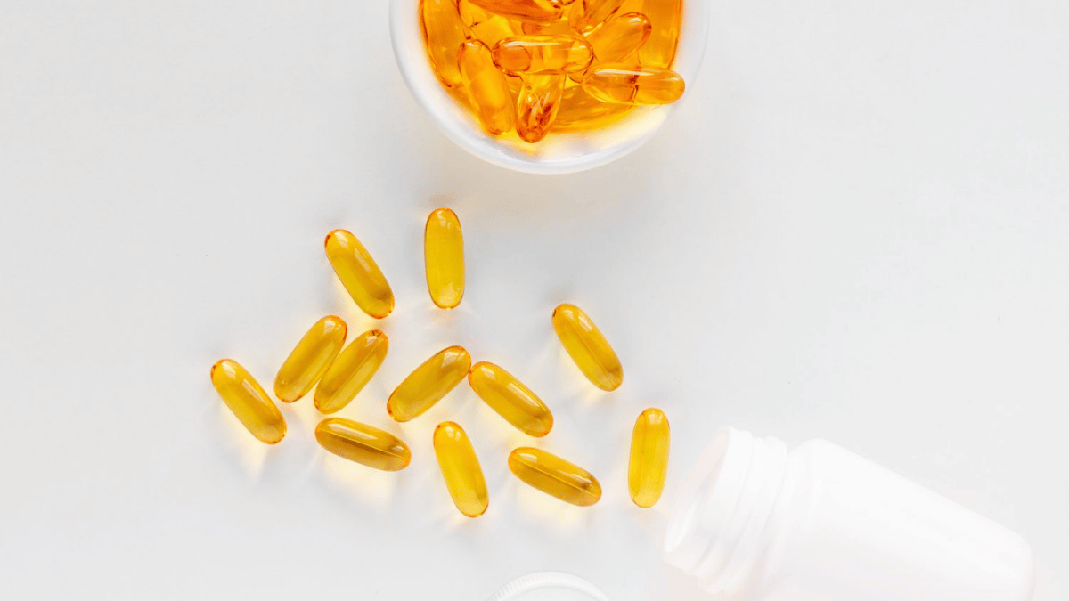 evening-fish-oil-capsules-on-wooden-table